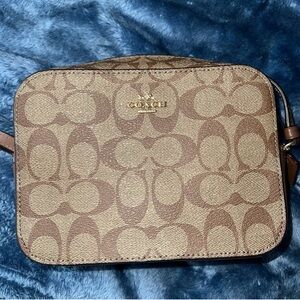 Coach mini cross body camera bag